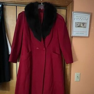 Elegant Red Coat with Black Fur Collar by SAXTON HALL.